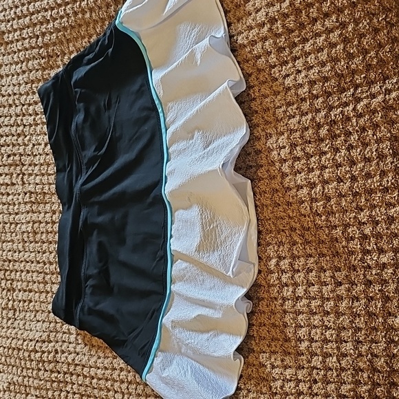 Activewear Sofibella Pickleball Tennis Skirt Black and White w/ Turquoise Stripe - Picture 2 of 4